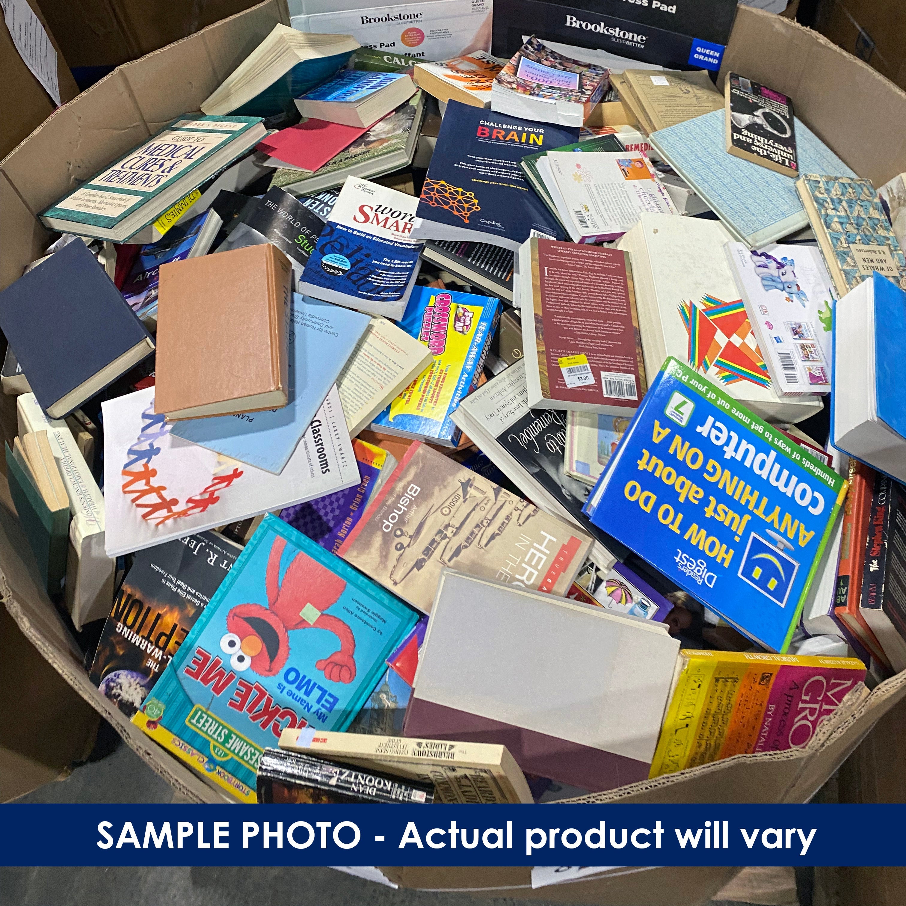 Pallet box filled with various books and educational materials.