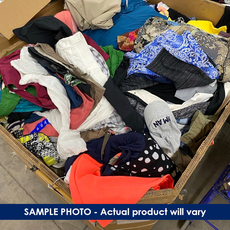 Pallet box filled with assorted used clothing.