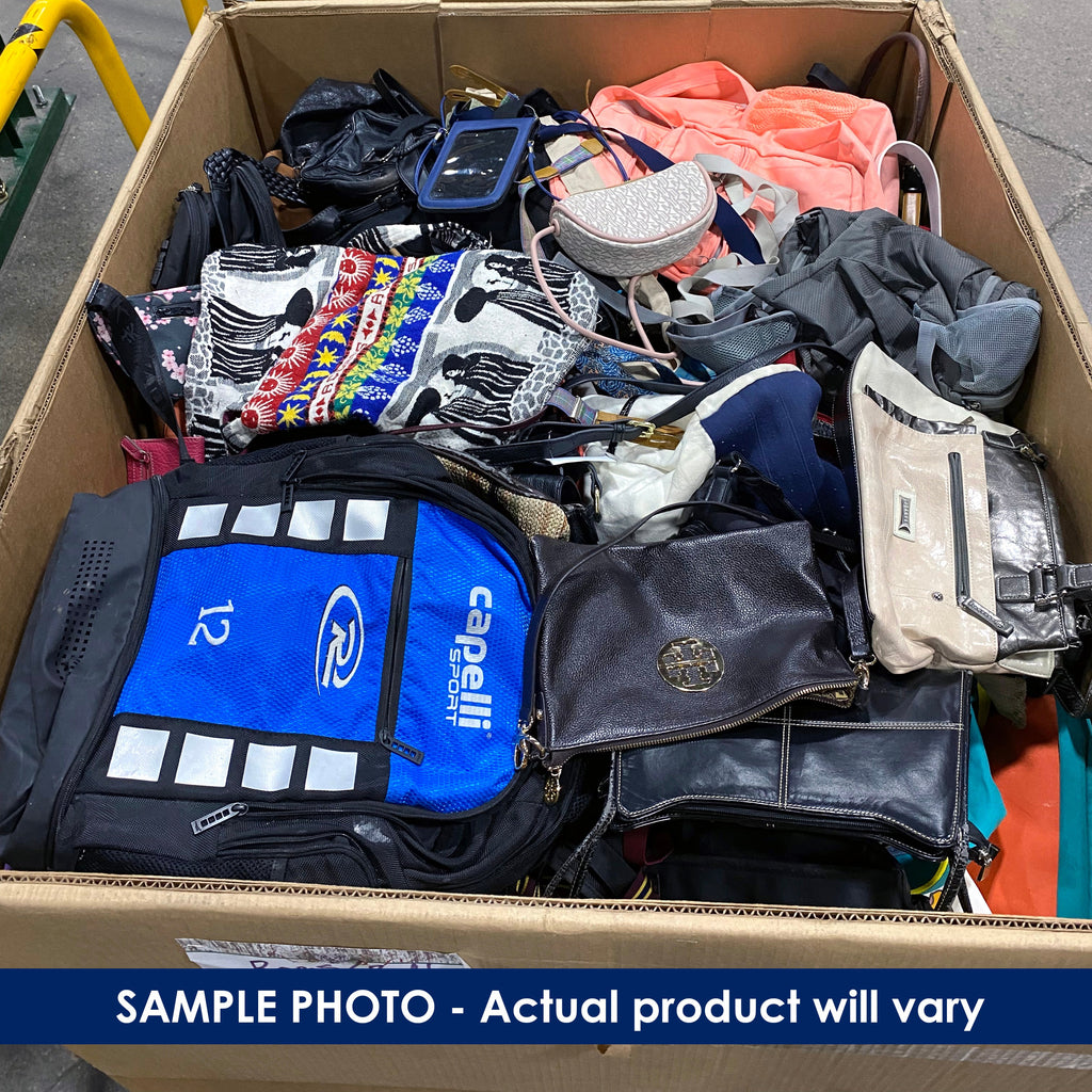 Pallet box filled with various items including a bags and purses.